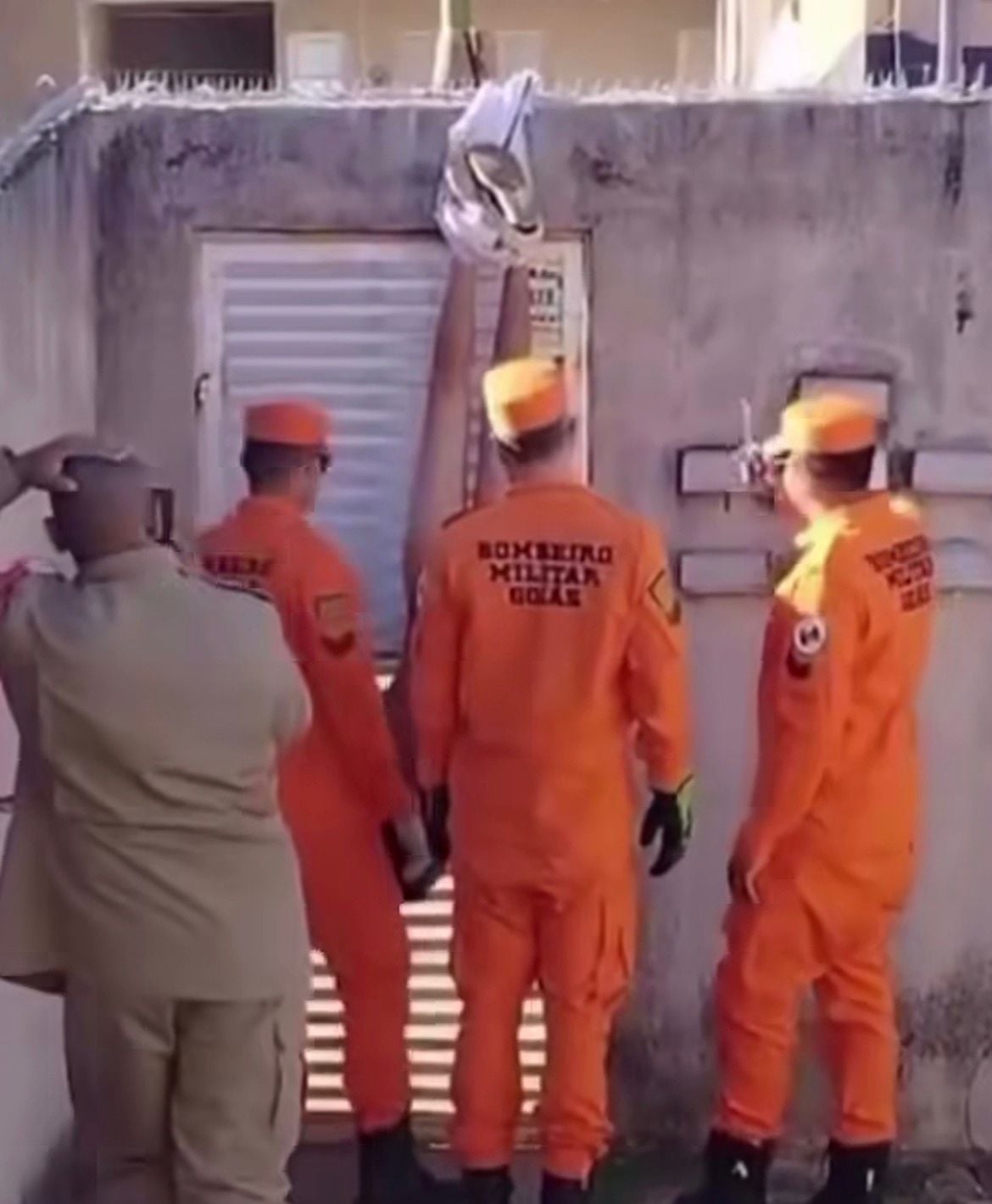 Man is left naked and trapped in condominium wall after trying to enter to look for ex-girlfriend