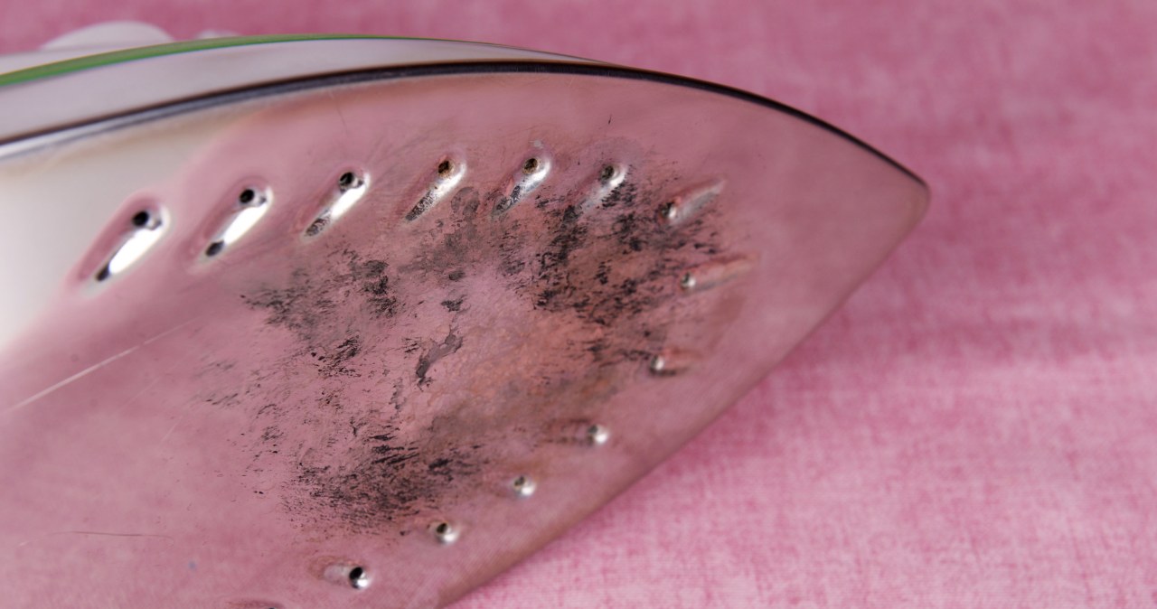 You deserve a medal for this trick. The burn from the iron disappears as soon as you remove it with your hand