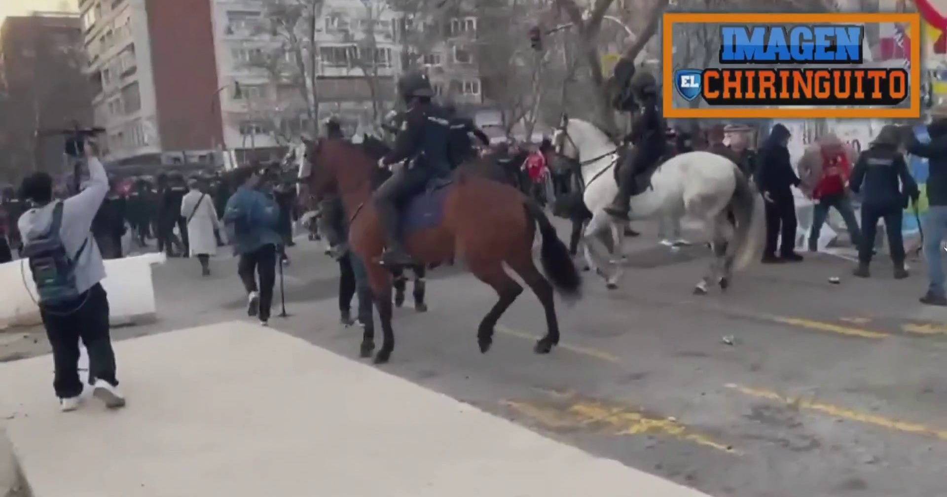 Benfica fans and Spanish police clash near the Santiago Bernabéu