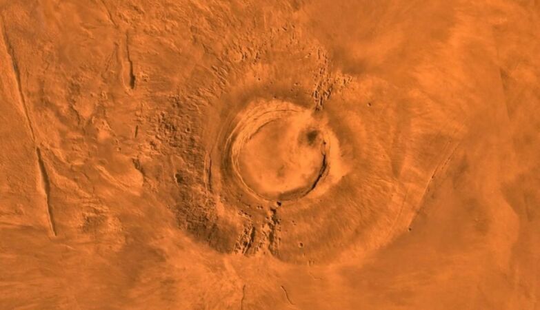 Martian volcanoes may be hiding giant glaciers under a layer of ash