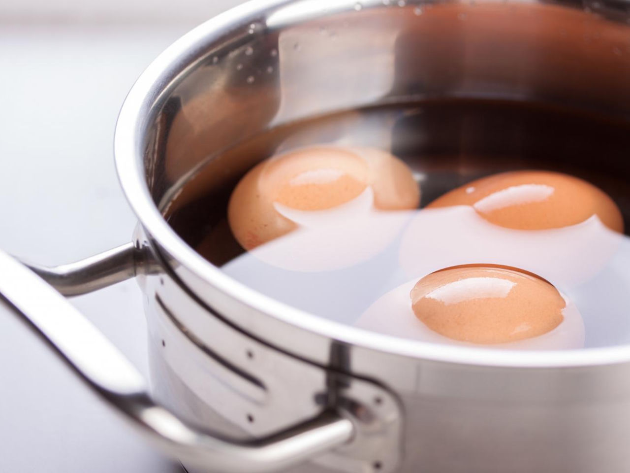 Kitchen Tips Egg shells won't come off? Throw it into the pot while it's cooking and forget about the problem