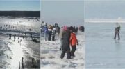 People walk and skate on the frozen sea on a beach in Poland