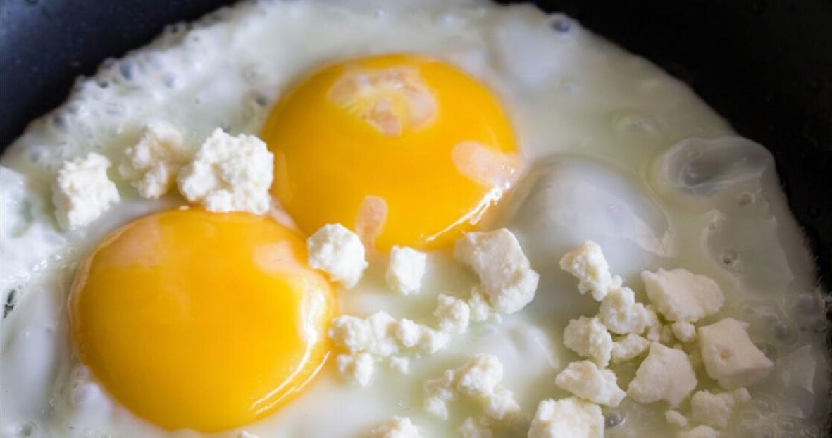 Crack the egg directly onto the cheese. You will never make classic scrambled eggs again