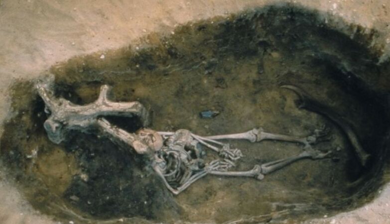 Stone Age boy discovered buried in deerskin and woodpecker cap