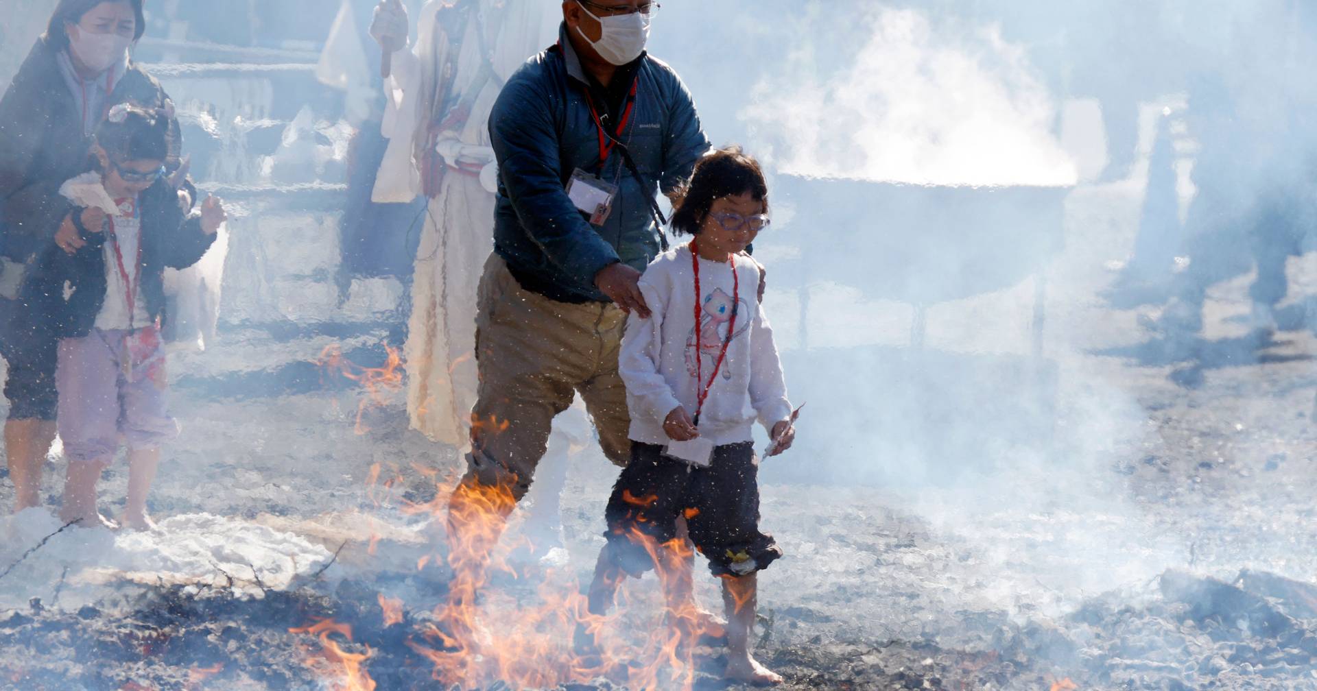 Walking on hot coals: images of the spiritual ritual of faith, discipline and overcoming at Takao-san Yakuo-in temple