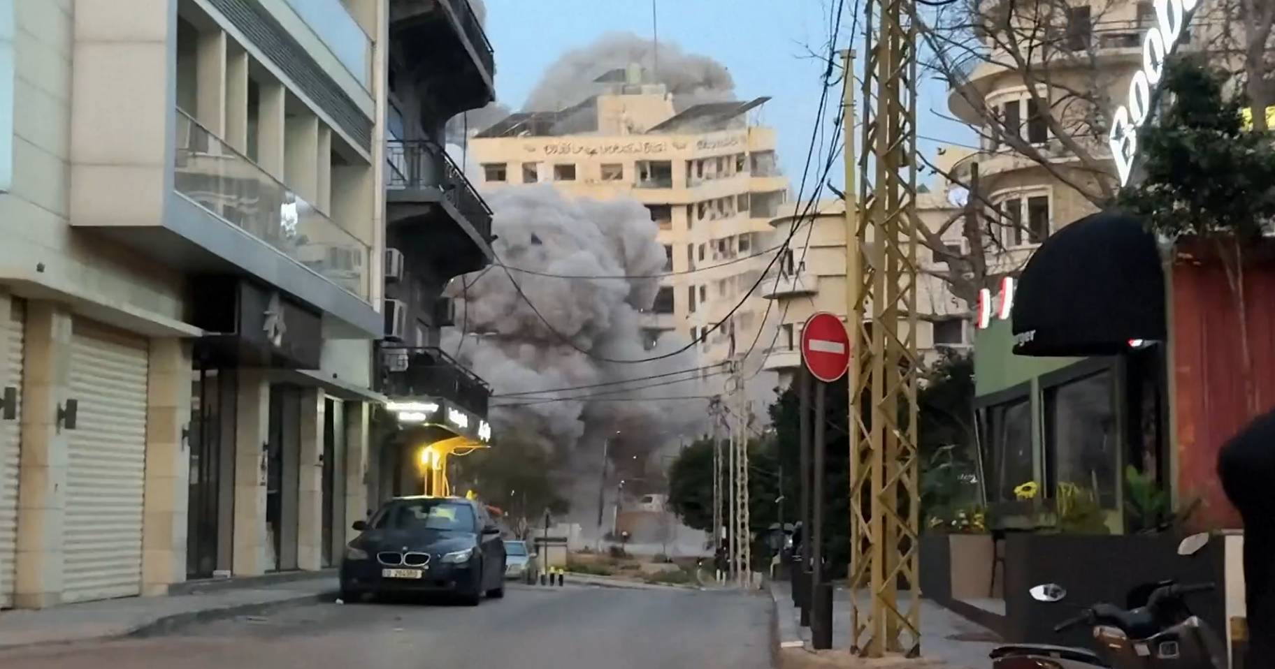 Residential building in central Beirut collapses after being hit by Israeli missile