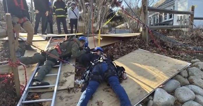 Images of Tessie's rescue: dog pulled from a deep, narrow hole