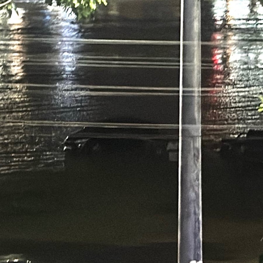 Car is surrounded by water and is at risk of being washed away by the Acre River