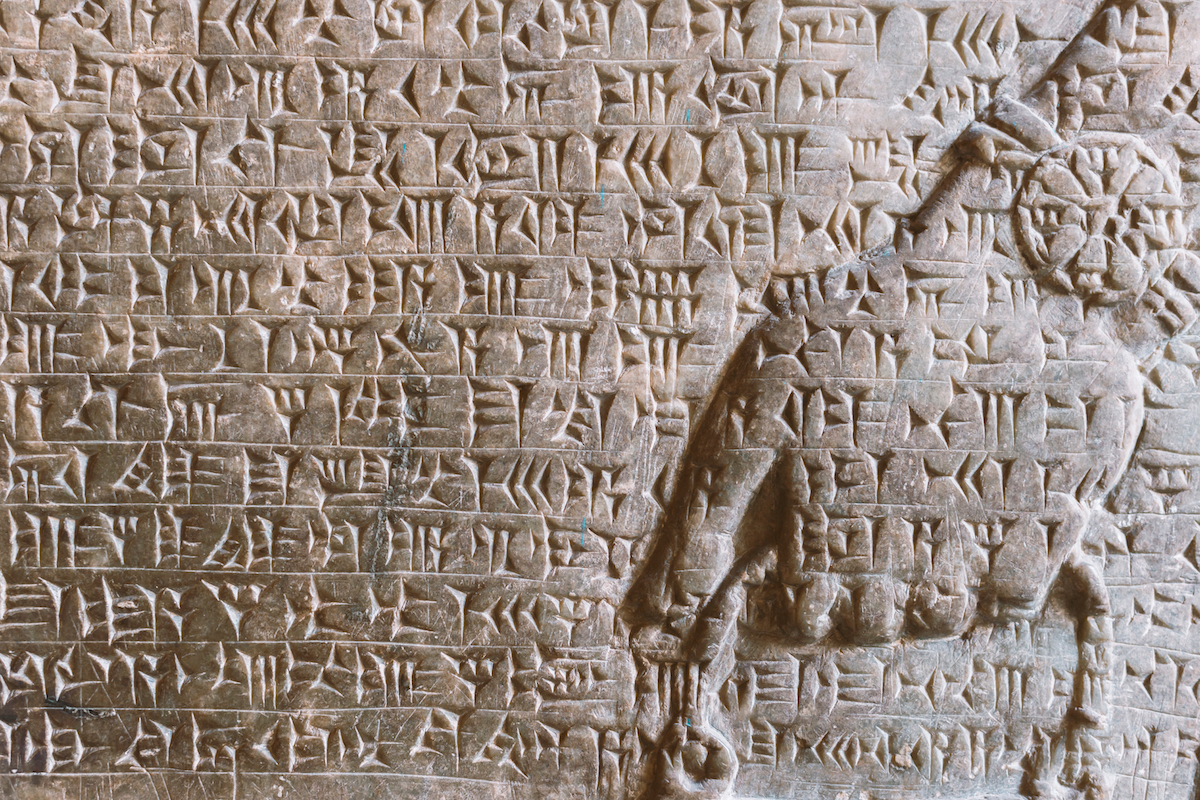 Humans invented writing several times, at different times, for the same reason