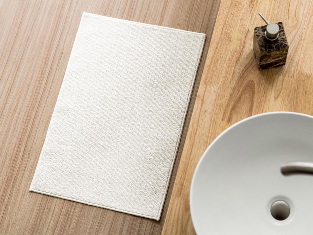 Home Tips A dirty bathroom rug is a thing of the past. This one ingredient kills bacteria and refreshes the material