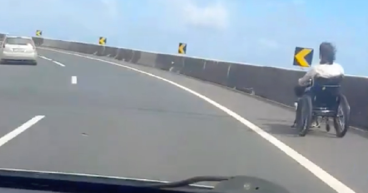 Man in wheelchair is intercepted while traveling on the highway in Madeira