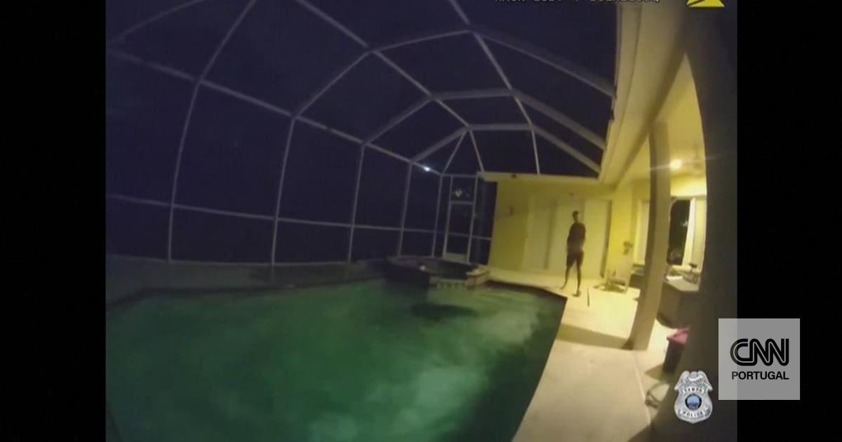 The moment a police officer had to capture an alligator from an indoor pool in Florida