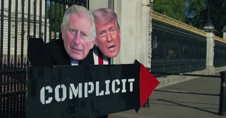 Protesters dressed as King Charles III and Trump protest against the monarch's visit to the USA