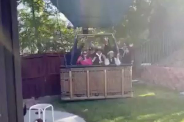 Hot air balloon makes an emergency landing and ends up in a private backyard