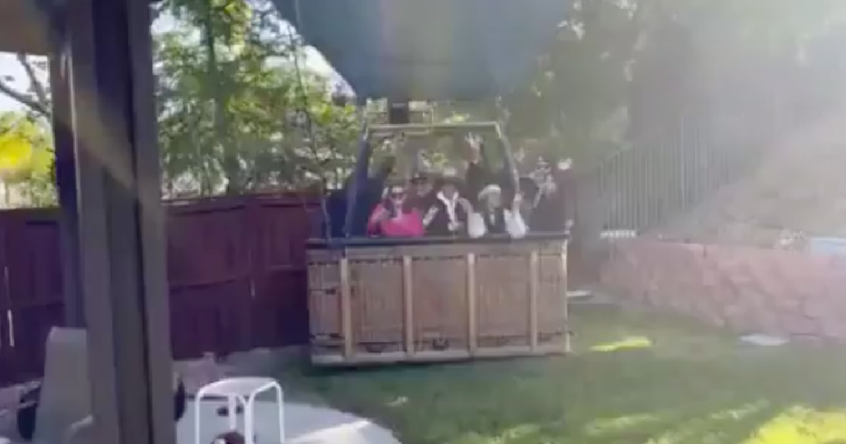 Hot air balloon makes an emergency landing and ends up in a private backyard