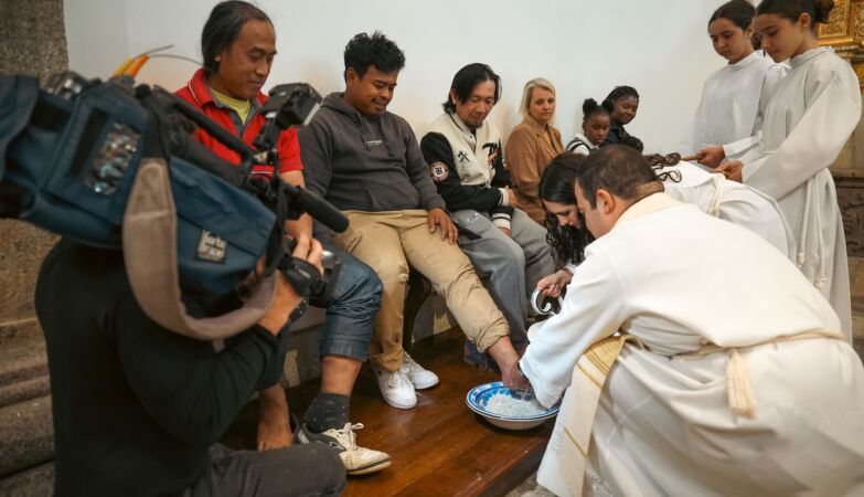 All 12 people at the footwash are immigrants. Because “we are all brothers”