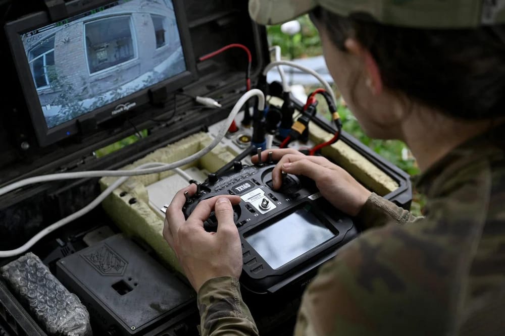 A drone pilot from Ukraine's 3rd Army Corps controls a drone with first-person view during a training flight at an undisclosed location in eastern Ukraine on August 12, 2025. (Genya Savilov/AFP/Getty Images)