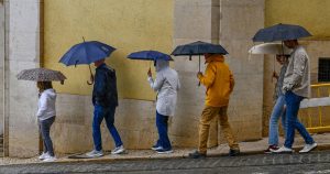 Heavy rain and thunderstorms leave two districts under yellow warning
