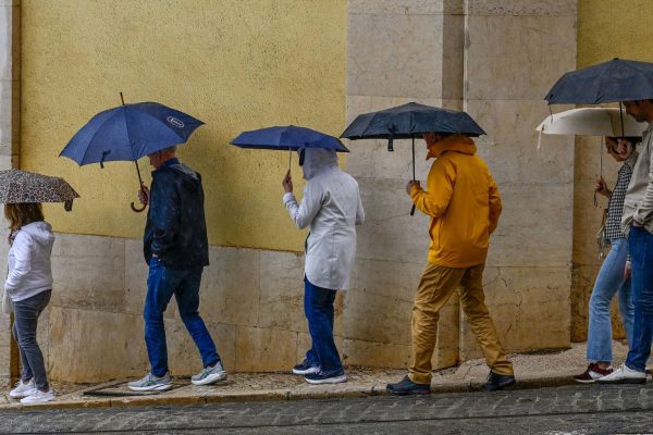 Heavy rain and thunderstorms leave two districts under yellow warning