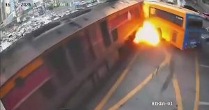 Train and bus collide in Thailand, several dead