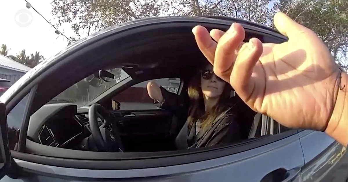 Driver accused of driving on cell phone shows arm with amputated hand