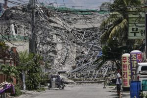 At least 30 people missing after a building under construction collapses in the Philippines