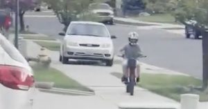 Woman drives on sidewalk to chase child on minibike