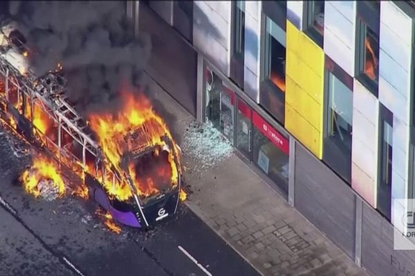 Bus on fire: the image that mirrors the violent protests in Belfast