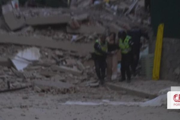 Impressive images show rescue teams trying to extract victims from completely destroyed buildings