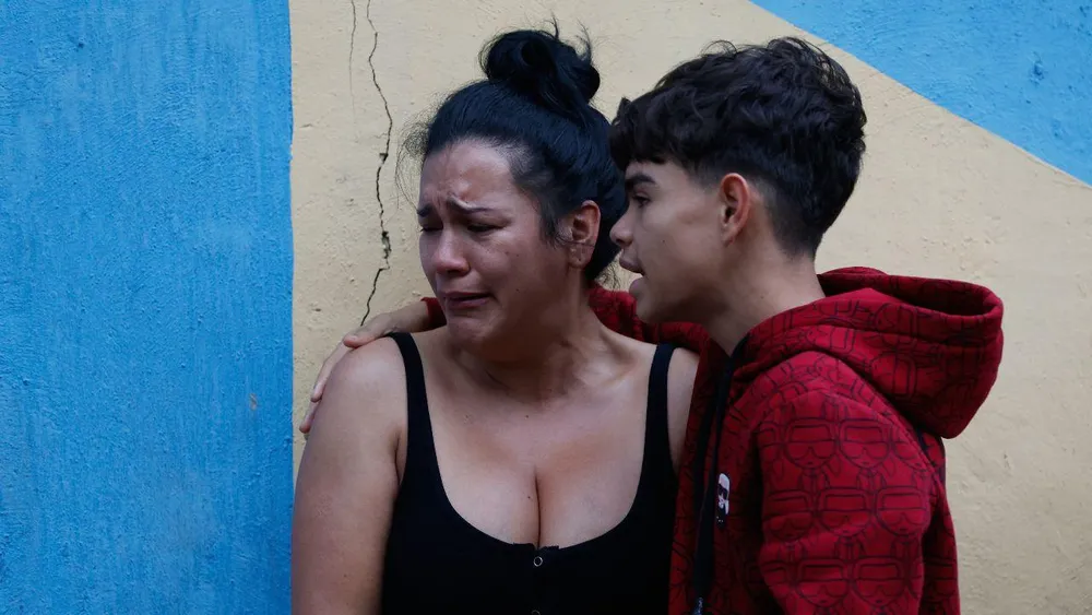 "I thought the house was going to fall on me": Daniel held on to what he could while Caracas shook. "We had a light at the end of the tunnel and now we're back to it": Susan experienced another wound from Venezuela from afar