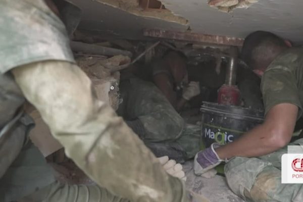 "It's an agonizing wait for someone who has a 7-year-old son trapped under the rubble." CNN followed a rescue operation in Venezuela