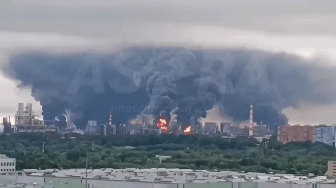 Smoke rises after Ukrainian drone attack on an oil refinery in Moscow (Telegram/Astra Press)