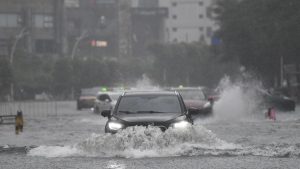Typhoon Mekkhala and Tropical Storm Higos move in unison towards Japan