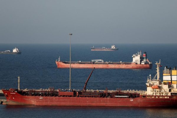 The US fires on an oil tanker heading to Iran's main oil port and raises tension in the Gulf